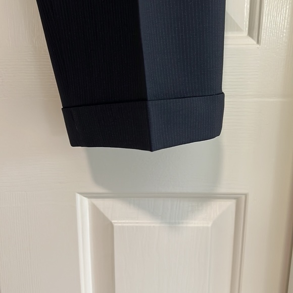 Men’s navy pin striped suit. Jacket is 43R and pants are a 36W, 31L. - Picture 7 of 12